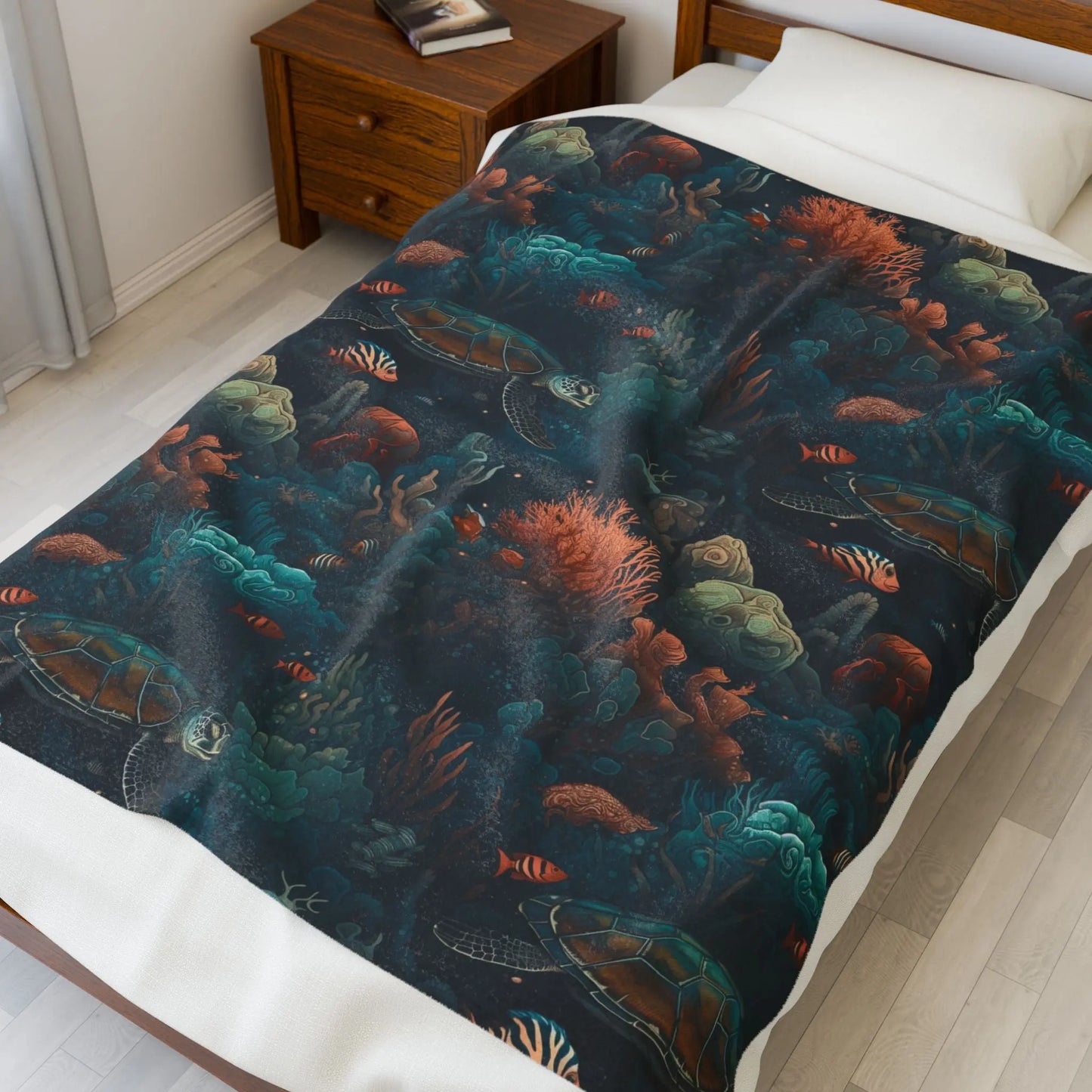 Our Velveteen 50 x 60" Plush Blanket with a dark underwater scene with coral, fish and sea turtles.