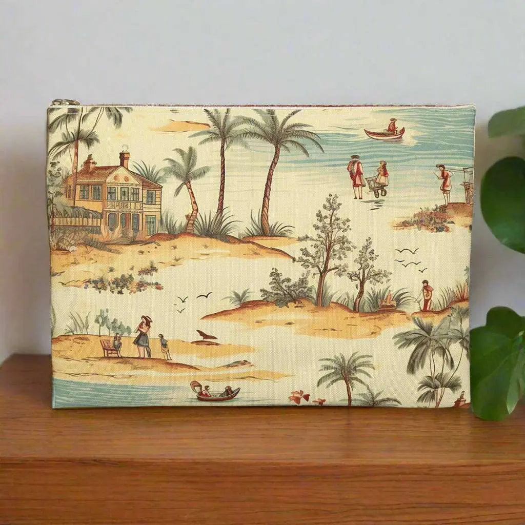 Our Vintage Beach Accessory Pouch constructed from a durable material with a zipper closure featuring a vintage beach scene. Available in small or large.