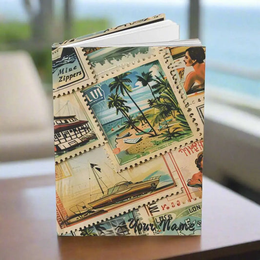 Journal with vintage travel stamps that can be personalized with your name.