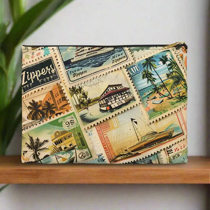 Our Vintage Traveler Accessory Pouch constructed from a durable material with a zipper closure featuring an array of vintage stamps. Available in small or large.