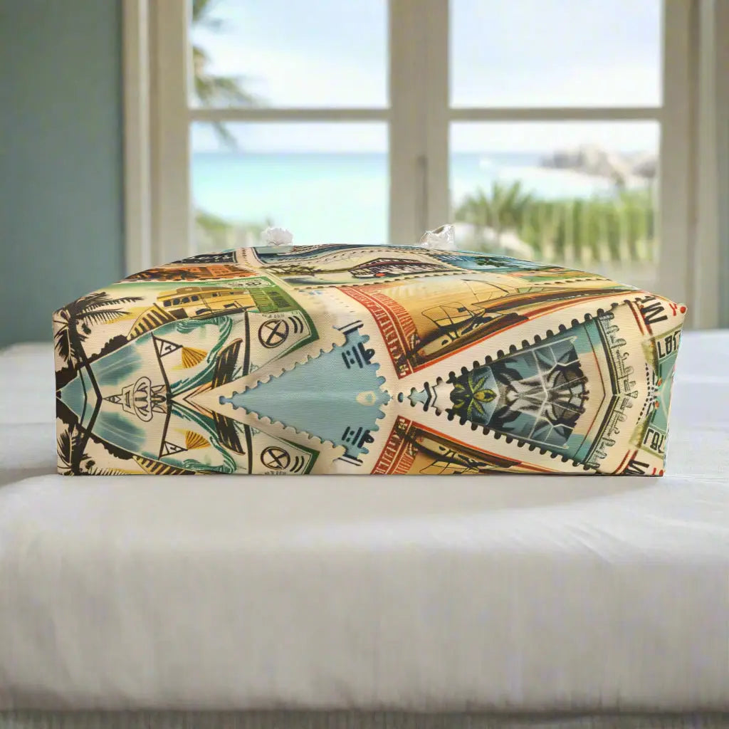 Bottom view of our Vintage Traveler Weekender Tote Bag constructed from a durable material with a rope handle with metal grommets featuring an array of vintage stamps. 