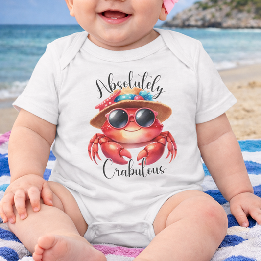 Baby wearing a onesie with a fancy crab design and text Absolutely Crabulous.