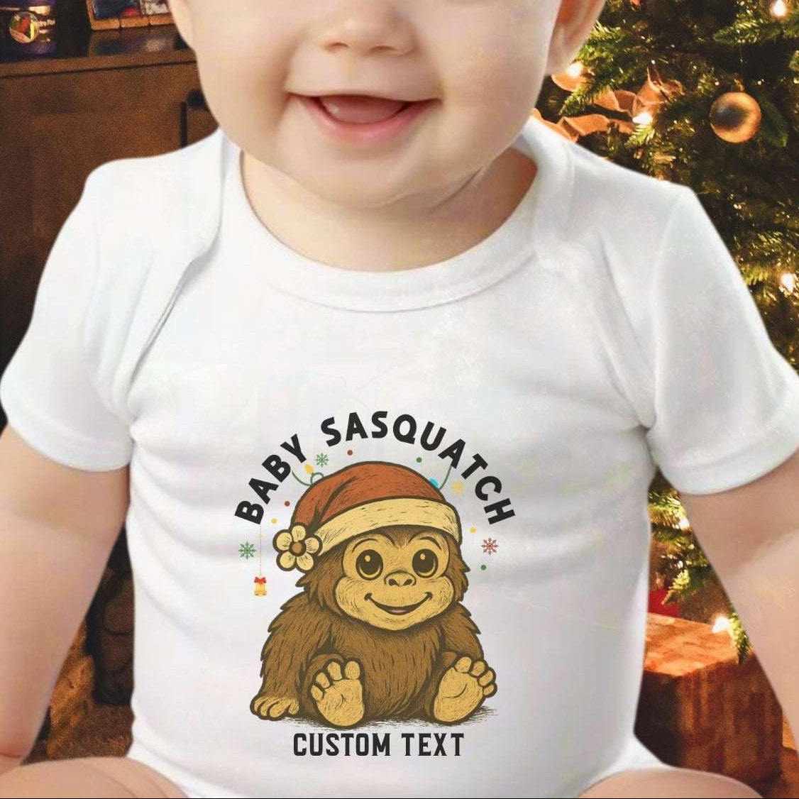 Baby wearing a onesie with a Sasquatch design with custom text.