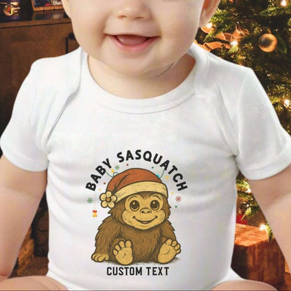 Baby wearing a onesie with a Sasquatch design with custom text.
