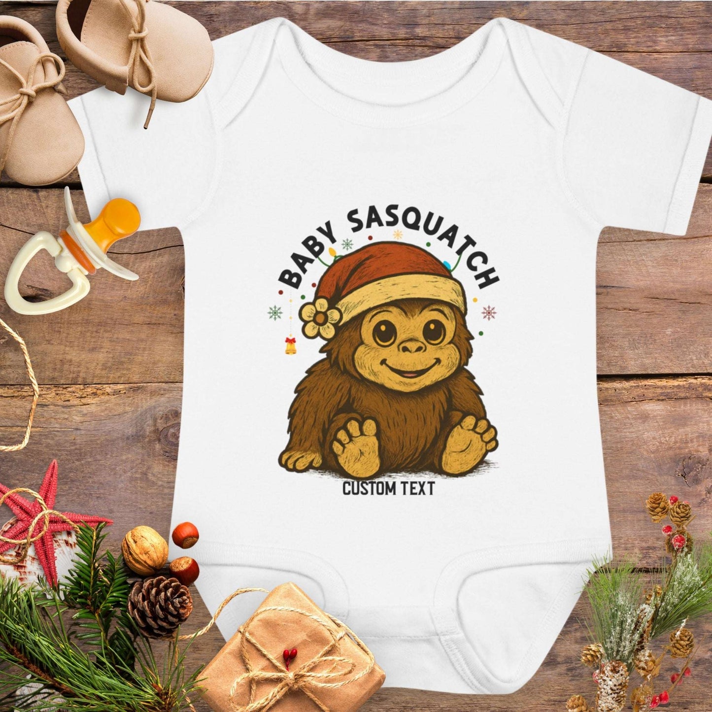 Baby onesie with 'Baby Sasquatch' design with custom text.