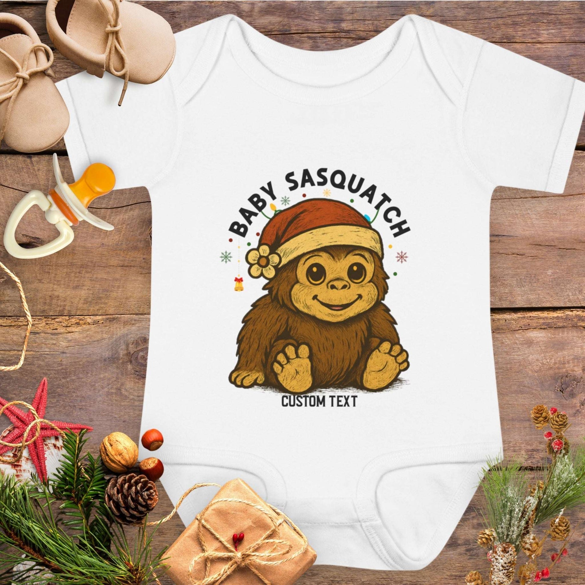 Baby onesie with 'Baby Sasquatch' design with custom text.