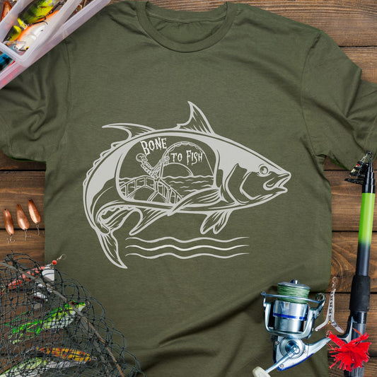 Military Green T-shirt with “Bone for Fishing” text inside a large fish silhouette containing a skeleton fishing off a boat, gothic nautical design for anglers.