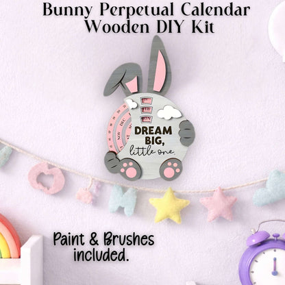 Bunny-shaped perpetual calendar wooden DIY kit with paint and brushes included shown completed.