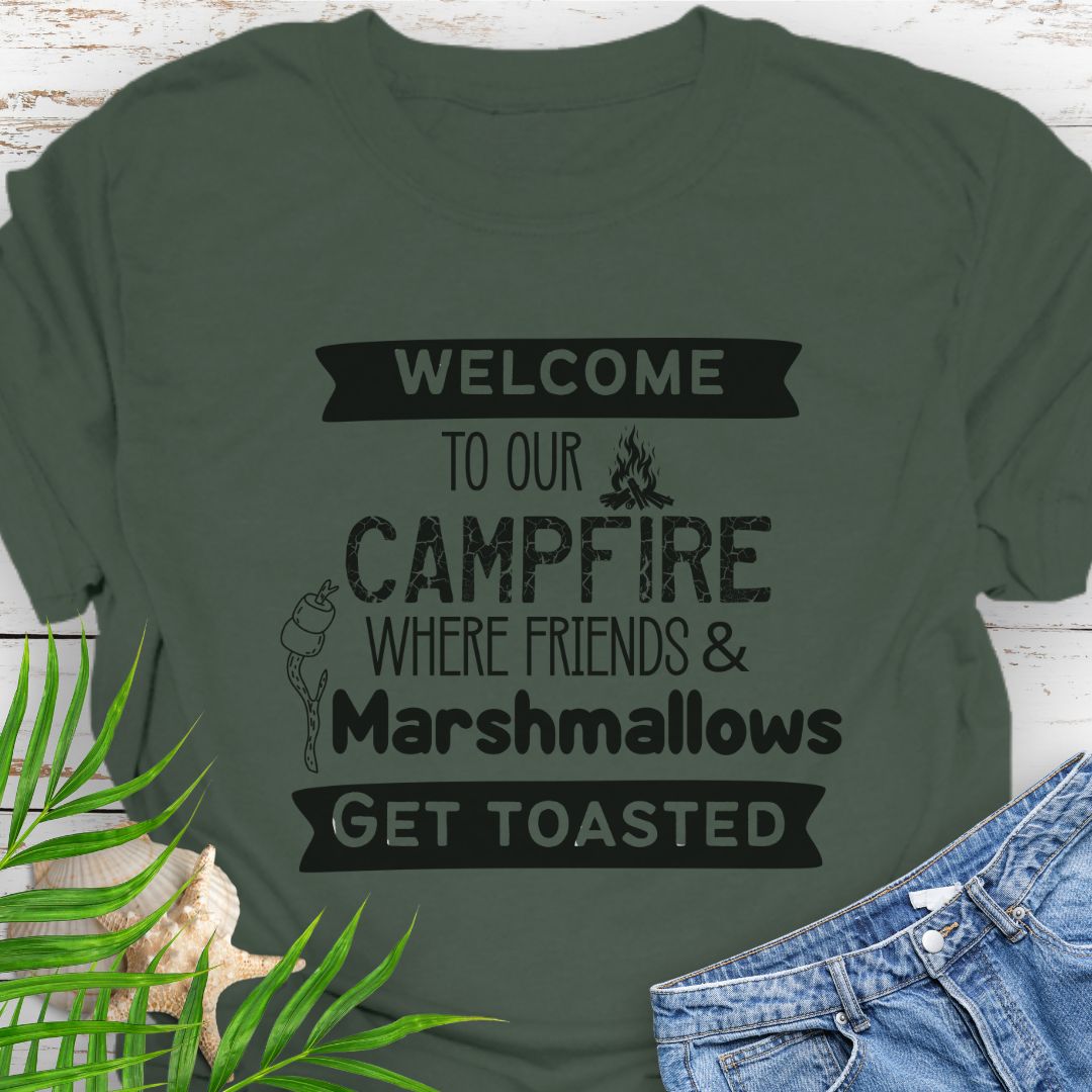 Military Green Funny “Welcome to Our Campfire Where Friends & Marshmallows Get Toasted” t-shirt with bold text design for campers and party lovers.
