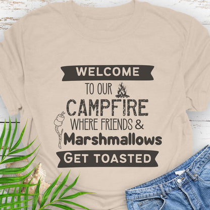Natural Funny “Welcome to Our Campfire Where Friends & Marshmallows Get Toasted” t-shirt with bold text design for campers and party lovers.
