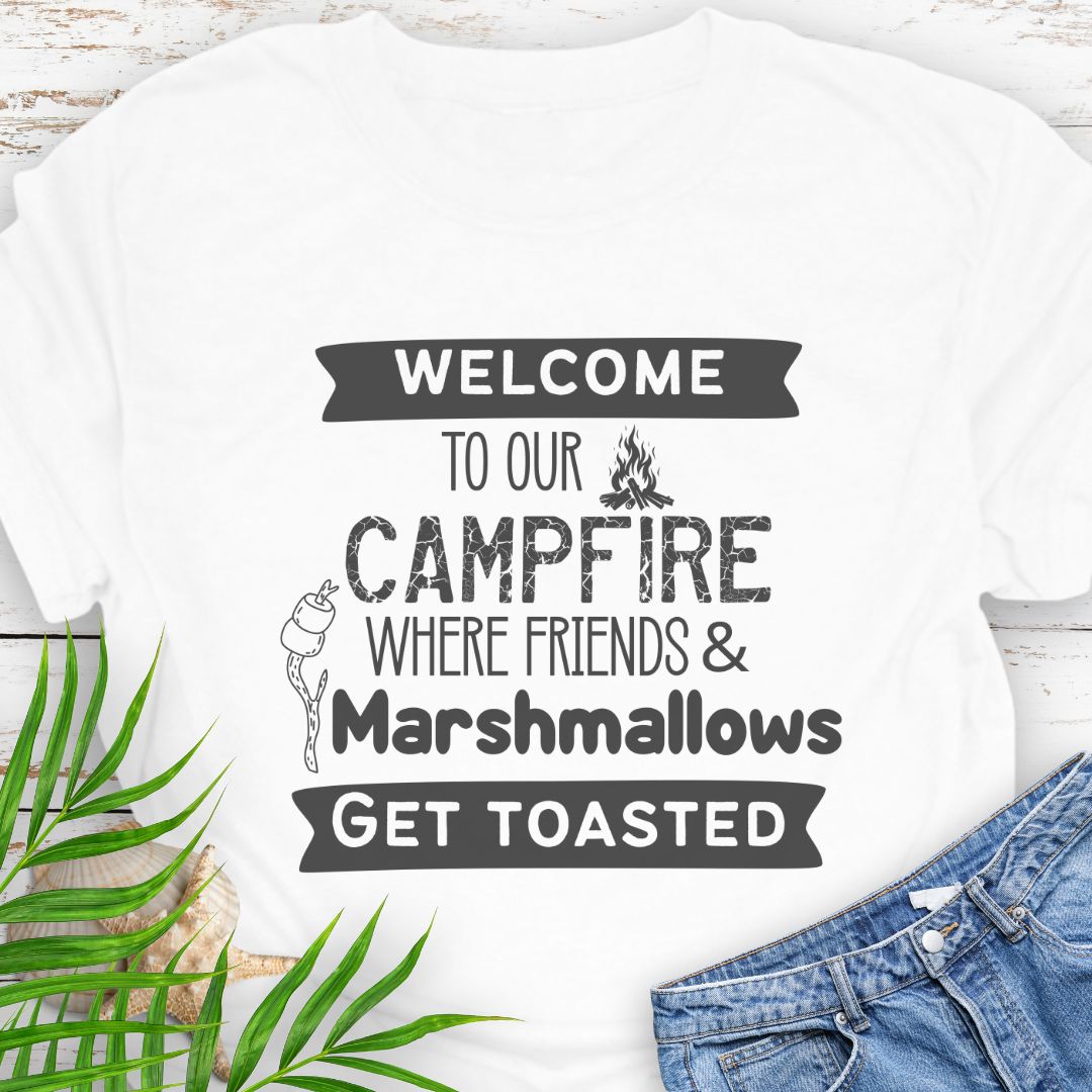 White Funny “Welcome to Our Campfire Where Friends & Marshmallows Get Toasted” t-shirt with bold text design for campers and party lovers.