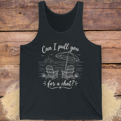 Black tank top with beach graphic and text  "Can I pull you for a chat?" on a wooden surface.