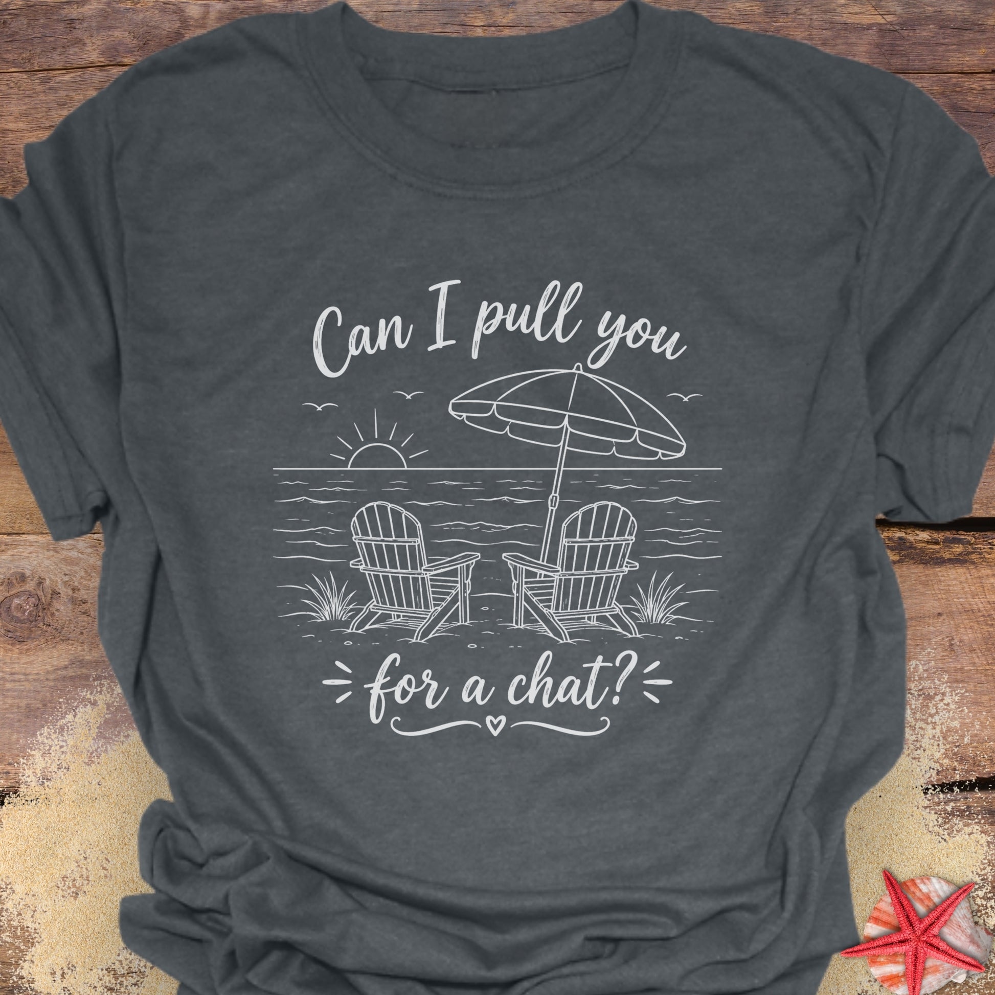Dark gray t-shirt with a beach graphic and text "Can I pull you for a chat?".