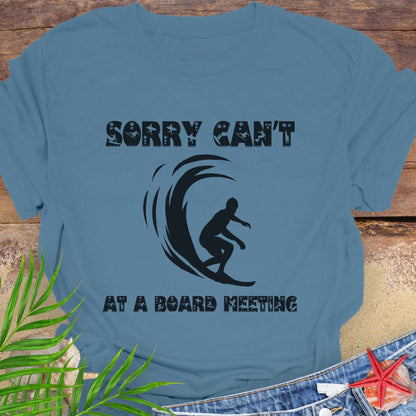 Indigo Blue t-shirt with a surfer and says Sorry Can't Board Meeting.