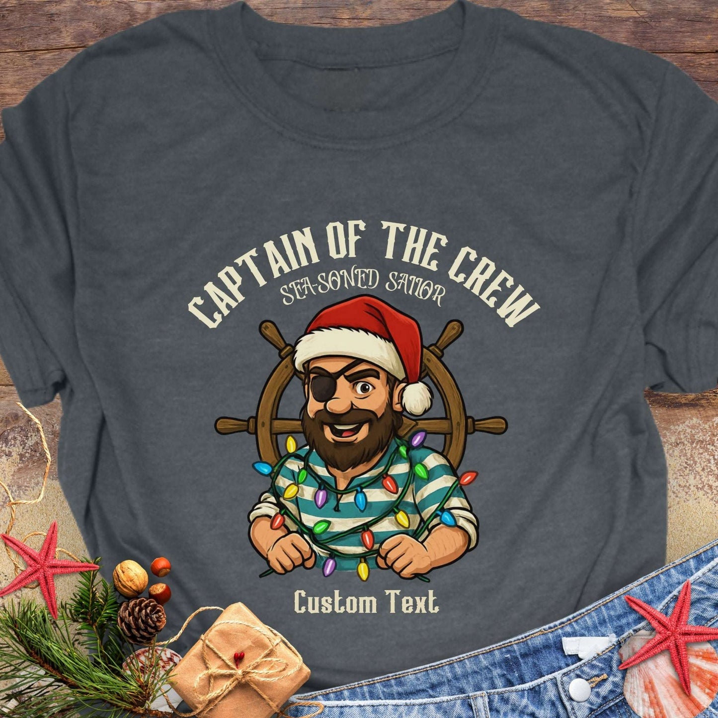 Dark Gray t-shirt with a pirate graphic and text 'Captain of the Crew Sea-soned Sailor' with Christmas decorations that can be personalized.