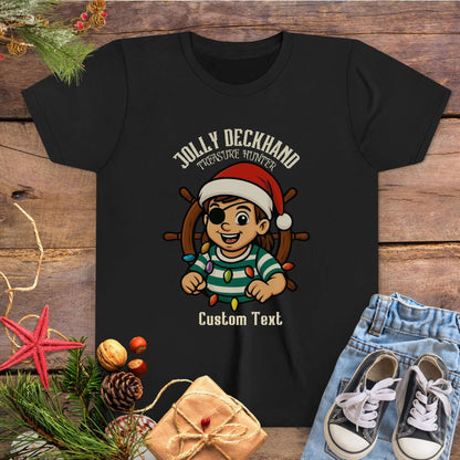 Black with Christmas-themed design featuring a cartoon girl pirate character and text 'Jolly Deckhand Treasure Hunter' that can be personalized.