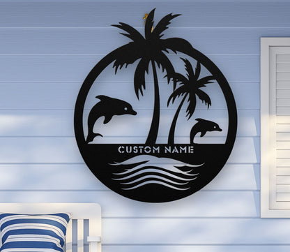 Black custom metal wall art featuring two dolphins jumping near palm trees with space for a family name, established year, or custom phrase in various sizes.