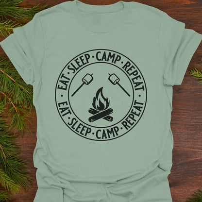 Light green  t-shirt with 'Eat Sleep Camp Repeat' graphic.