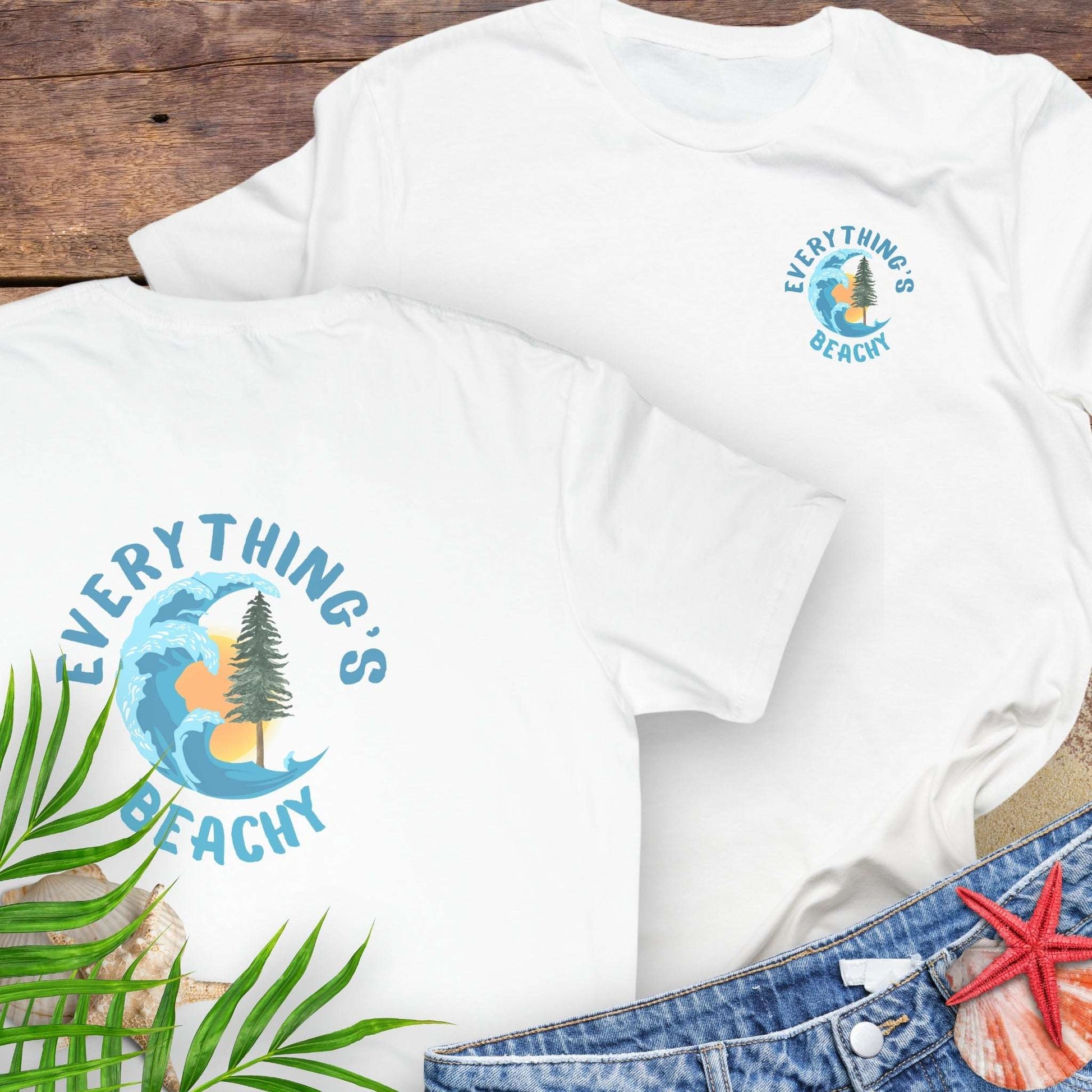 White t-shirt with Everything’s Beachy logo with wave, sun, and redwood graphic.