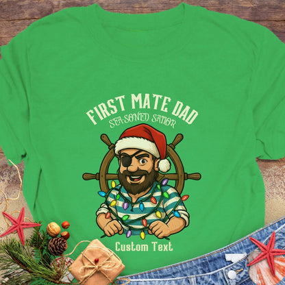 Green t-shirt with a cartoon pirate wearing a Santa hat and  'First Mate Dad' text that can be personalized.