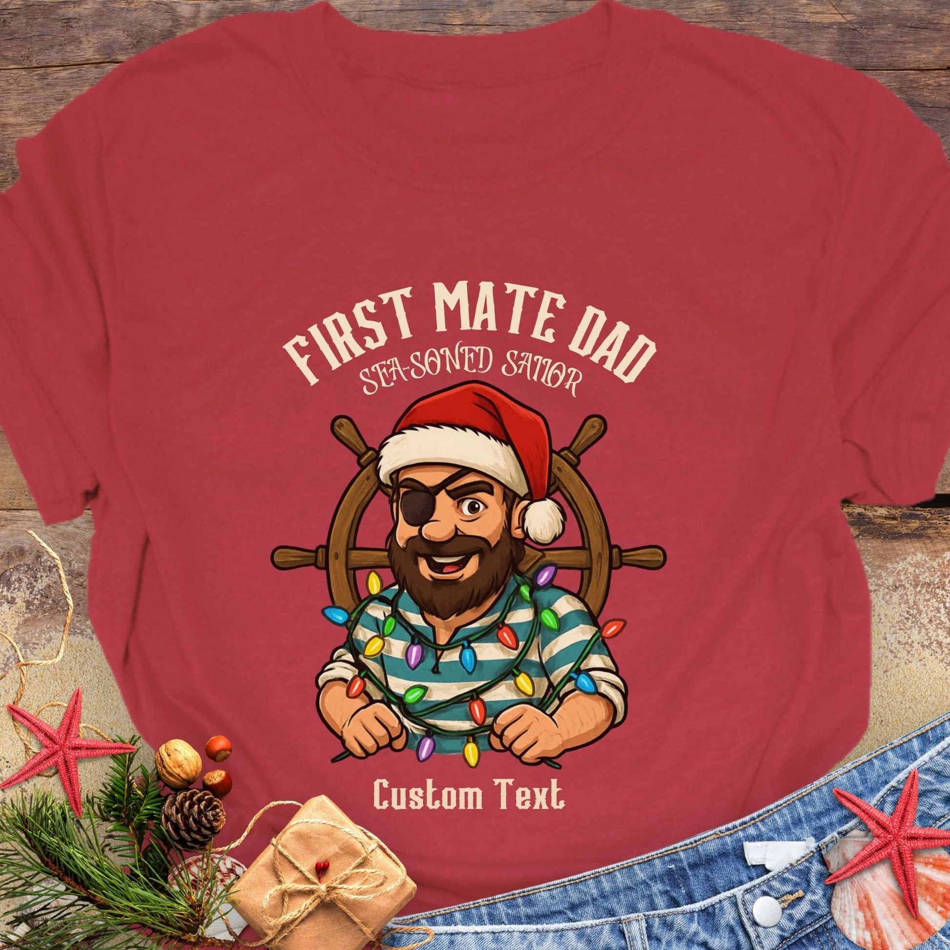Red t-shirt with a cartoon pirate wearing a Santa hat and  'First Mate Dad' text that can be personalized.
