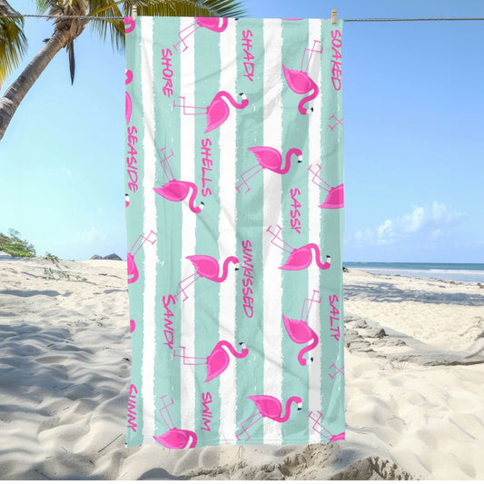 Aqua and white striped beach towel with pink flamingos and playful summer words like Sunshine, Sassy, and Salty.