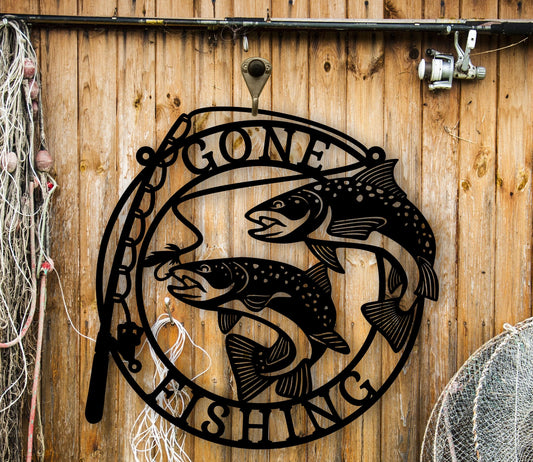 Black Metal wall art featuring the phrase “Gone Fishing” with a fishing rod and fish silhouette, crafted from steel and available in multiple sizes and finishes.