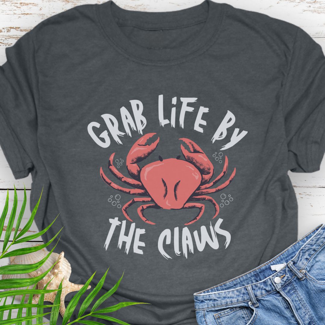 Dark Heather Unisex t-shirt with 'Grab Life by the Claws' crab graphic on front – coastal-themed summer apparel