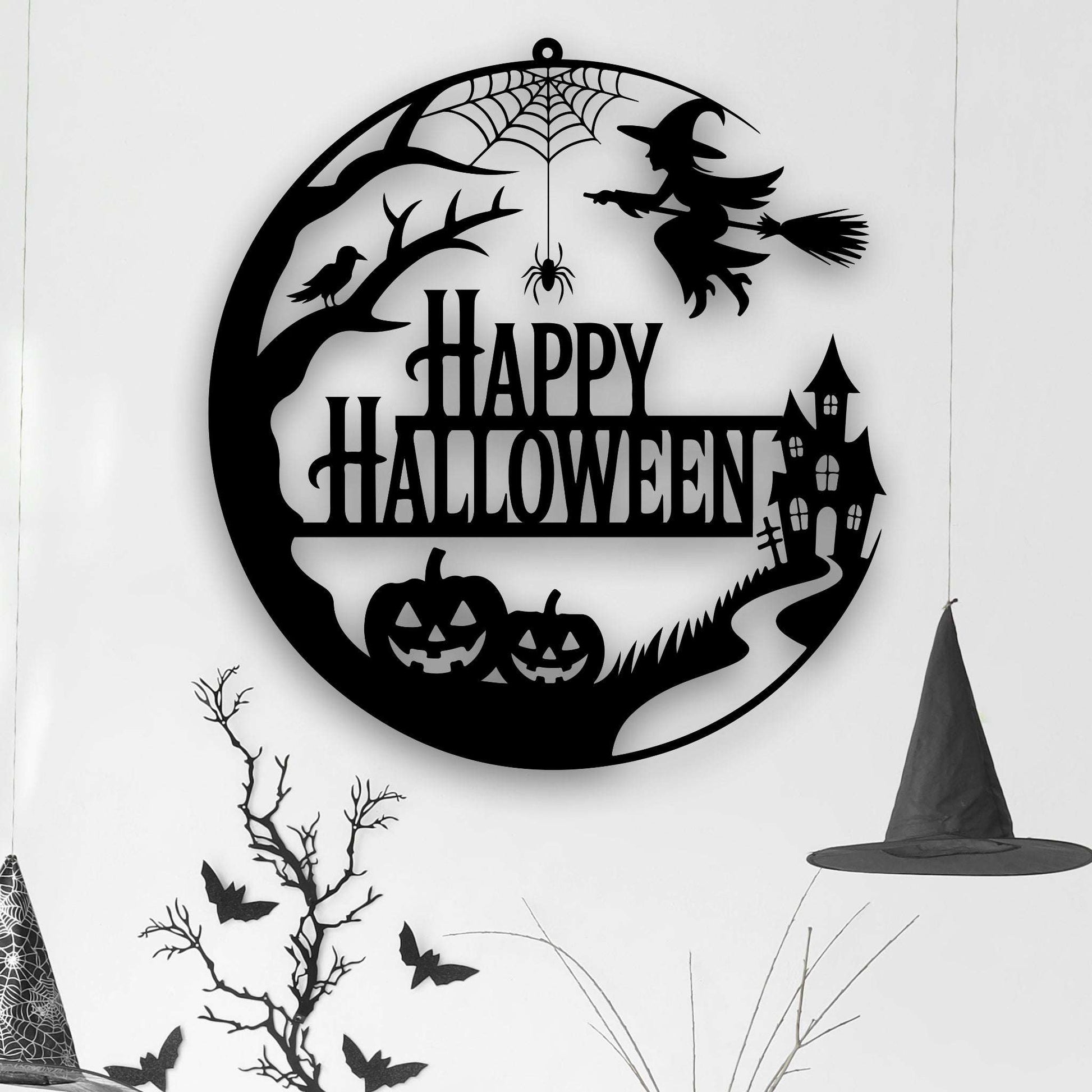 Black decorative metal wall art with Halloween-themed design featuring pumpkins, a witch, and text Happy Halloween.