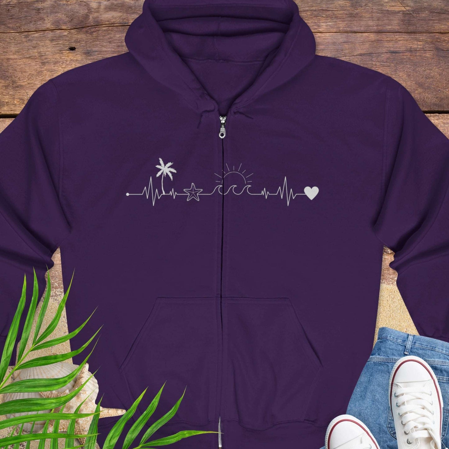 Purple zipped hoodie sweatshirt with a palm tree, starfish, sun and heart on a heartline design.