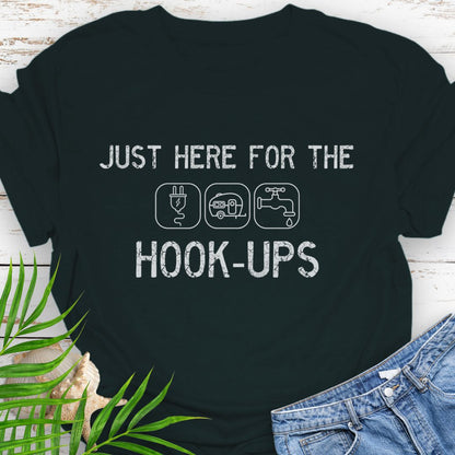 Black  funny camping t-shirt with ‘Here for the Hook-ups’ text and RV utility icons.
