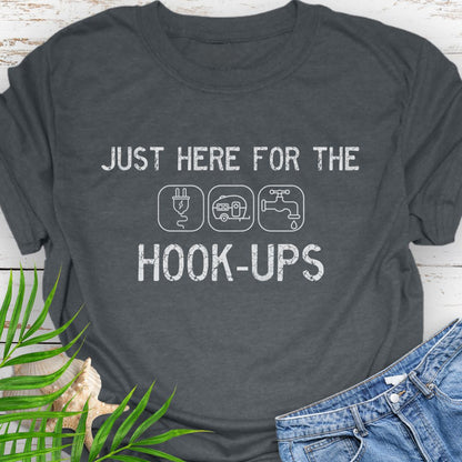 Dark Heather  funny camping t-shirt with ‘Here for the Hook-ups’ text and RV utility icons.