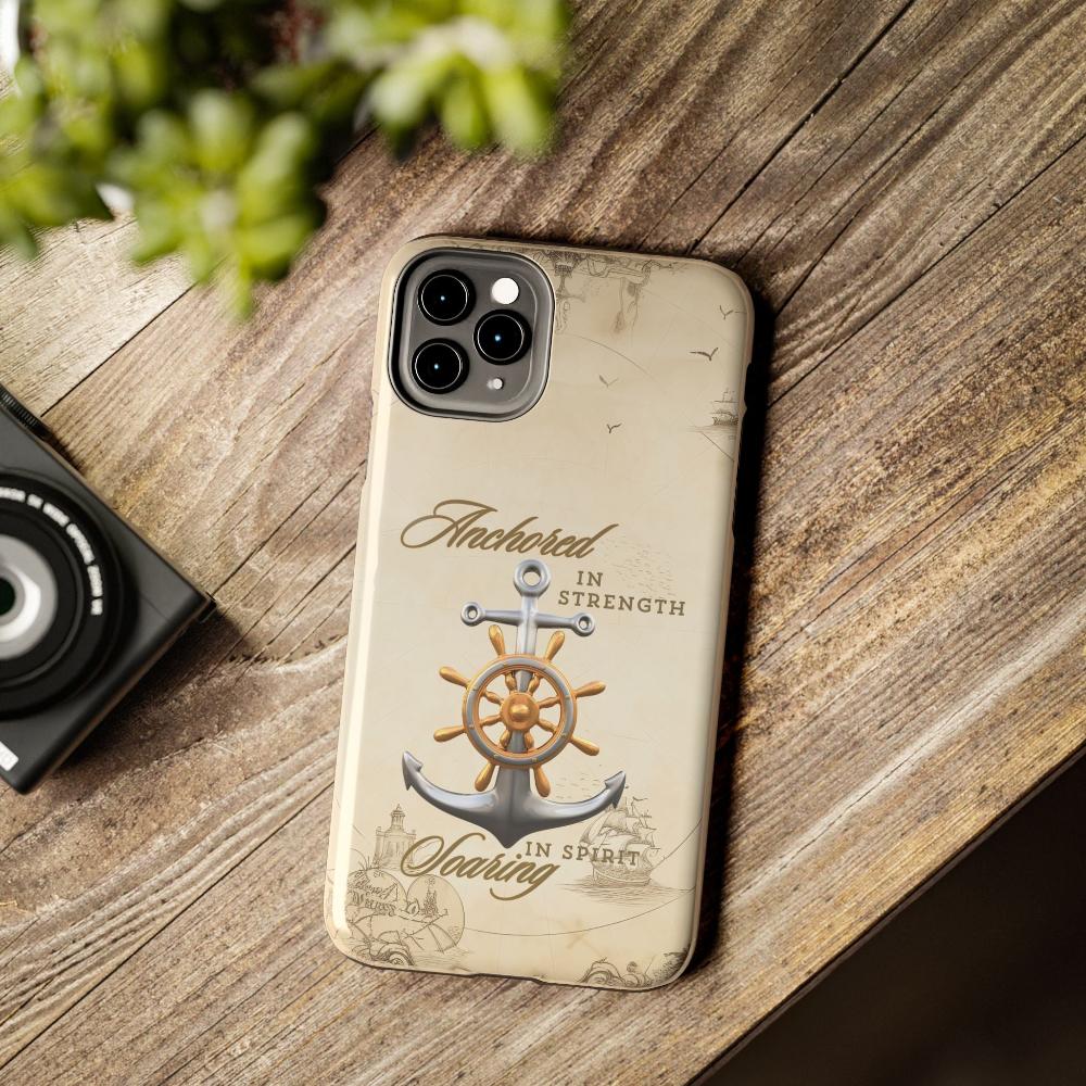 Iphone 11 Pro Max Cell phone cover Silver Anchor with silver and gold ship wheel on top with text Anchored in strength Soaring in Spirit on beige nautical map background.