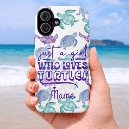 iPhone 17 air phone case with turtle design and text held by a hand on a beach