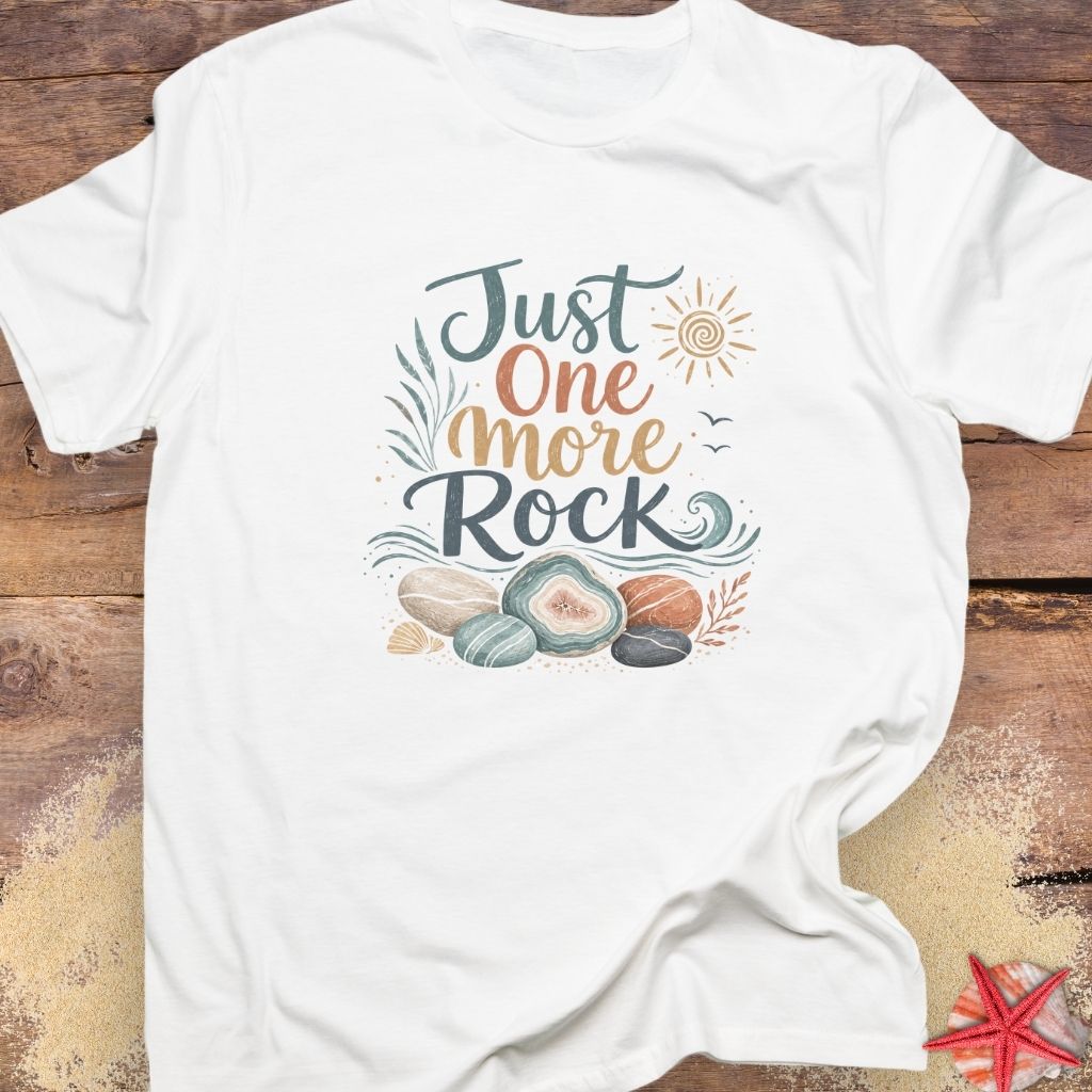 A white "Just One More Rock" graphic  unisex t-shirt featuring colorful beach stones and agates.
