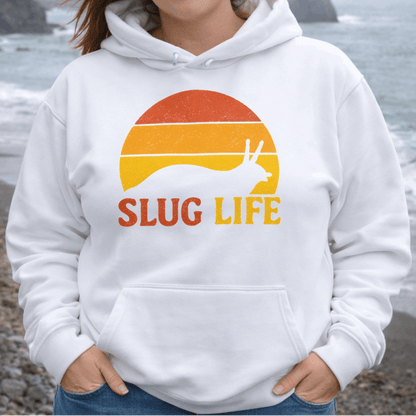 Woman wearing a white hoodie with 'SLUG LIFE' retro sunset design.