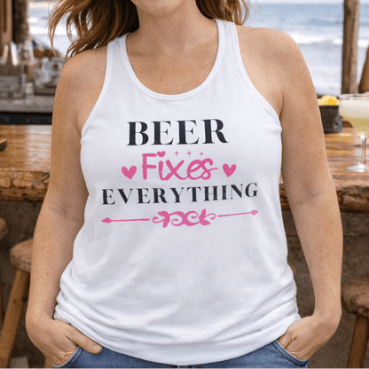 Woman wearing a white tank top with 'Beer Fixes Everything' text at a beachside bar.