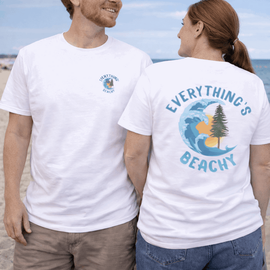 Two people wearing white t-shirts with 'Everything's Beachy' design on a beach.