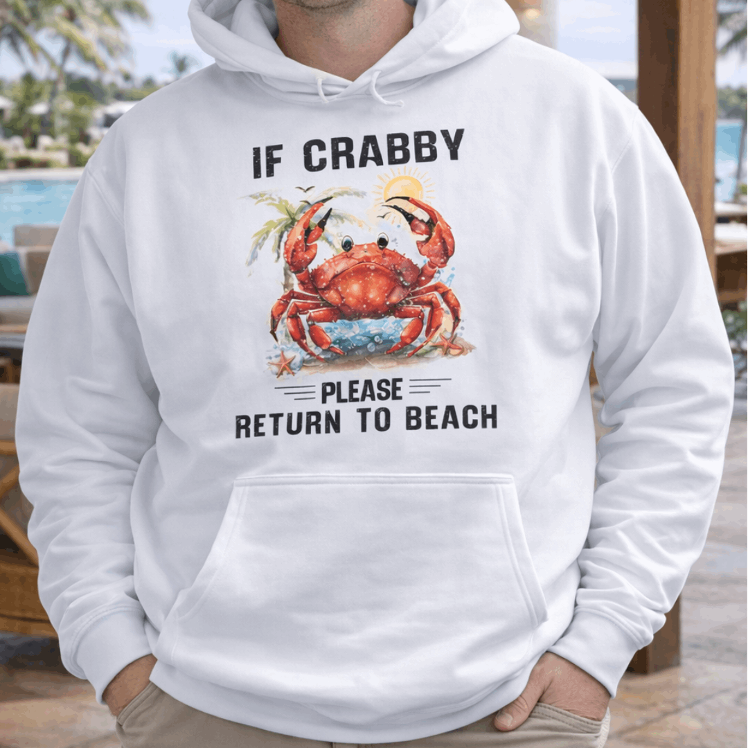Man wearing a white hoodie with a crab graphic and text If Crabby Please Return to Beach.