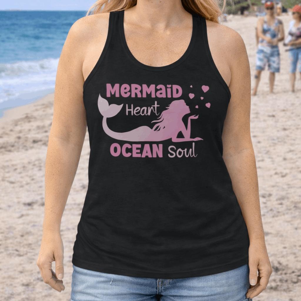 Woman wearing a black racerback tank top with mermaid blowing heart bubbles with the phrase Mermaid Heart Ocean Soul.