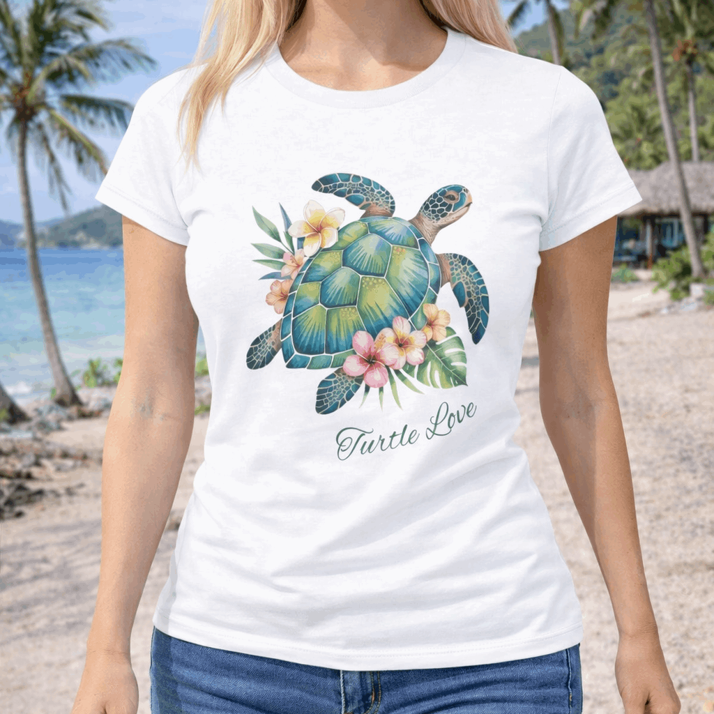 Person wearing a white t-shirt with a sea turtle and hibiscus flower design.