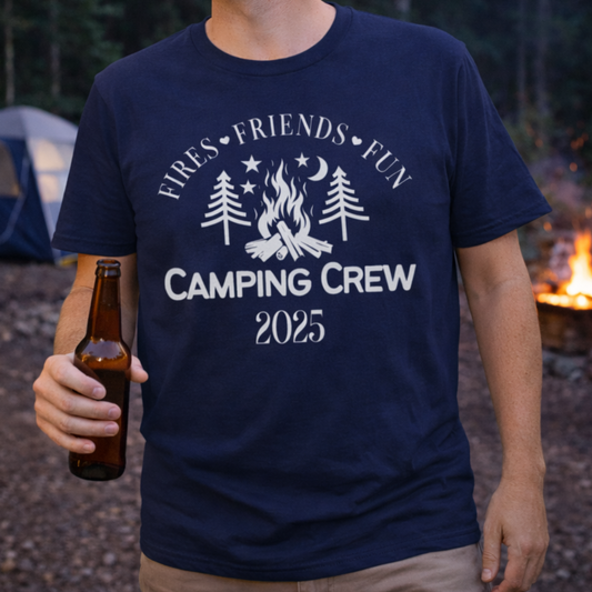 Man wearing a 'Camping Crew 2025' t-shirt holding a beer at a campsite.