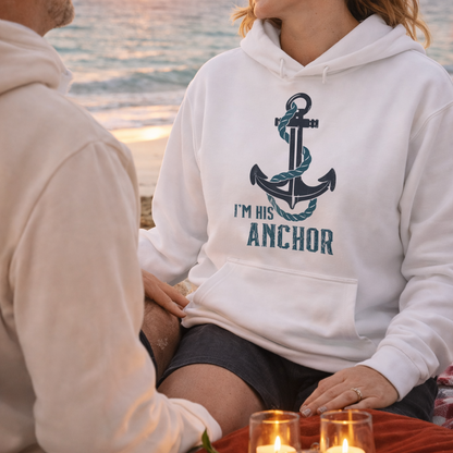 A woman wearing a hoodie with an anchor with text I'm His Anchor.