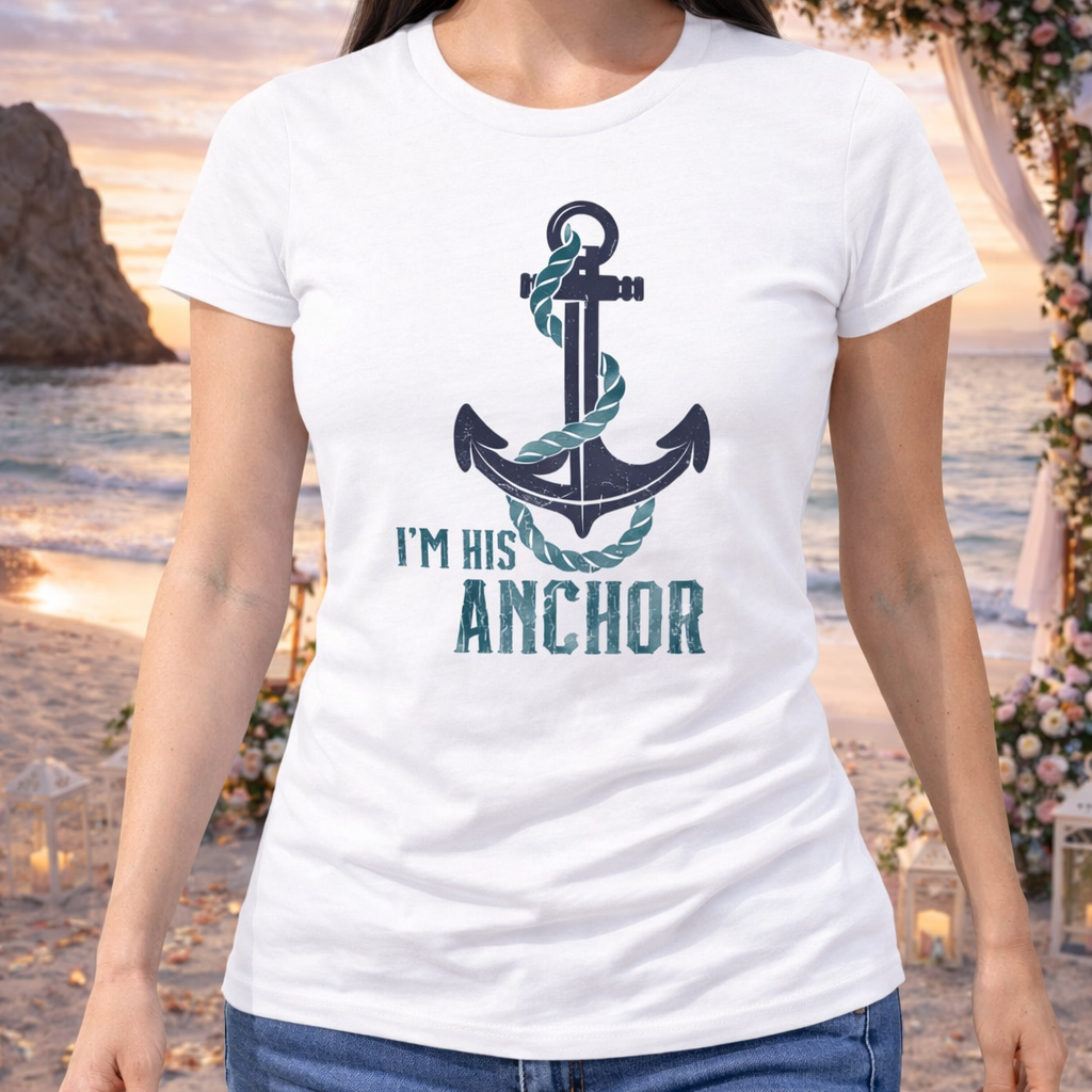 Person wearing a white t-shirt with an anchor design and 'I'm his anchor' text, standing on a beach.
