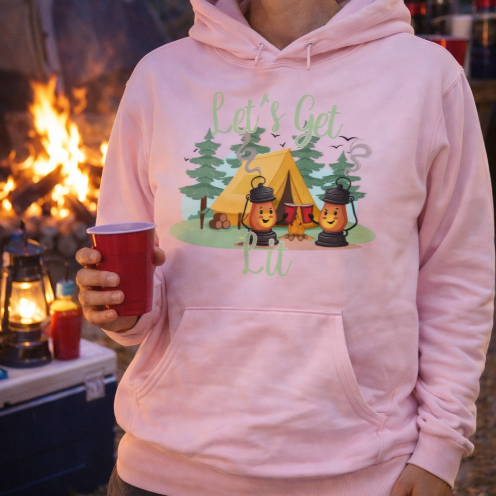 Person wearing a pink hoodie with camping party design with text Let's Get Lit.