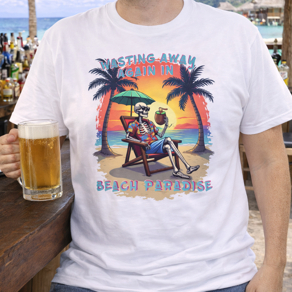 Man wearing a t-shirt with a graphic design of a skeleton man relaxing on a beach, holding a coconut cocktail.