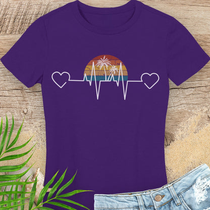 Purple t-shirt with a heart rate design featuring a sunset and palm trees.