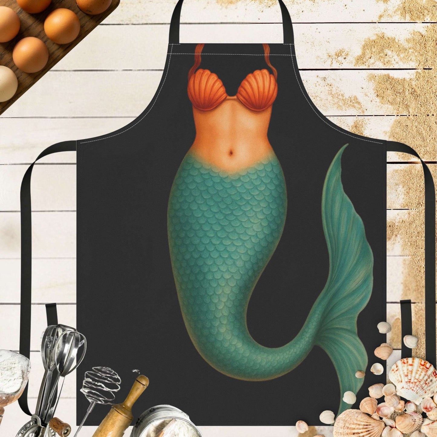 A fun black apron with a mermaid body.