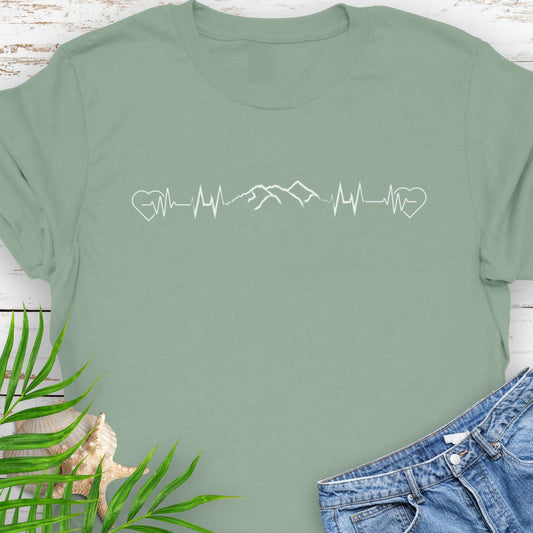 Sage T-shirt with heartbeat design featuring mountain range for nature lovers.