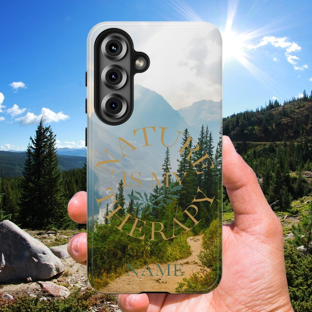 Phone case with nature design and text 'Nature is my Therapy'.